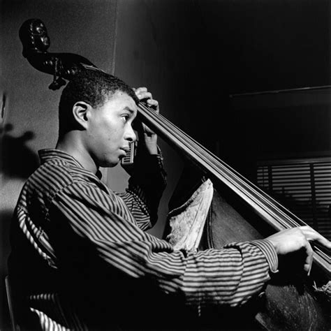 Paul Chambers playing an upright bass